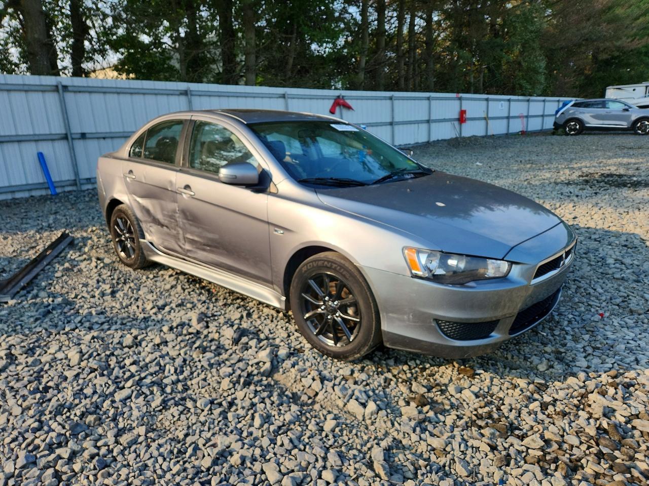 JA32U2FU6FU018571 · 2015 MITSUBISHI LANCER · 4/13