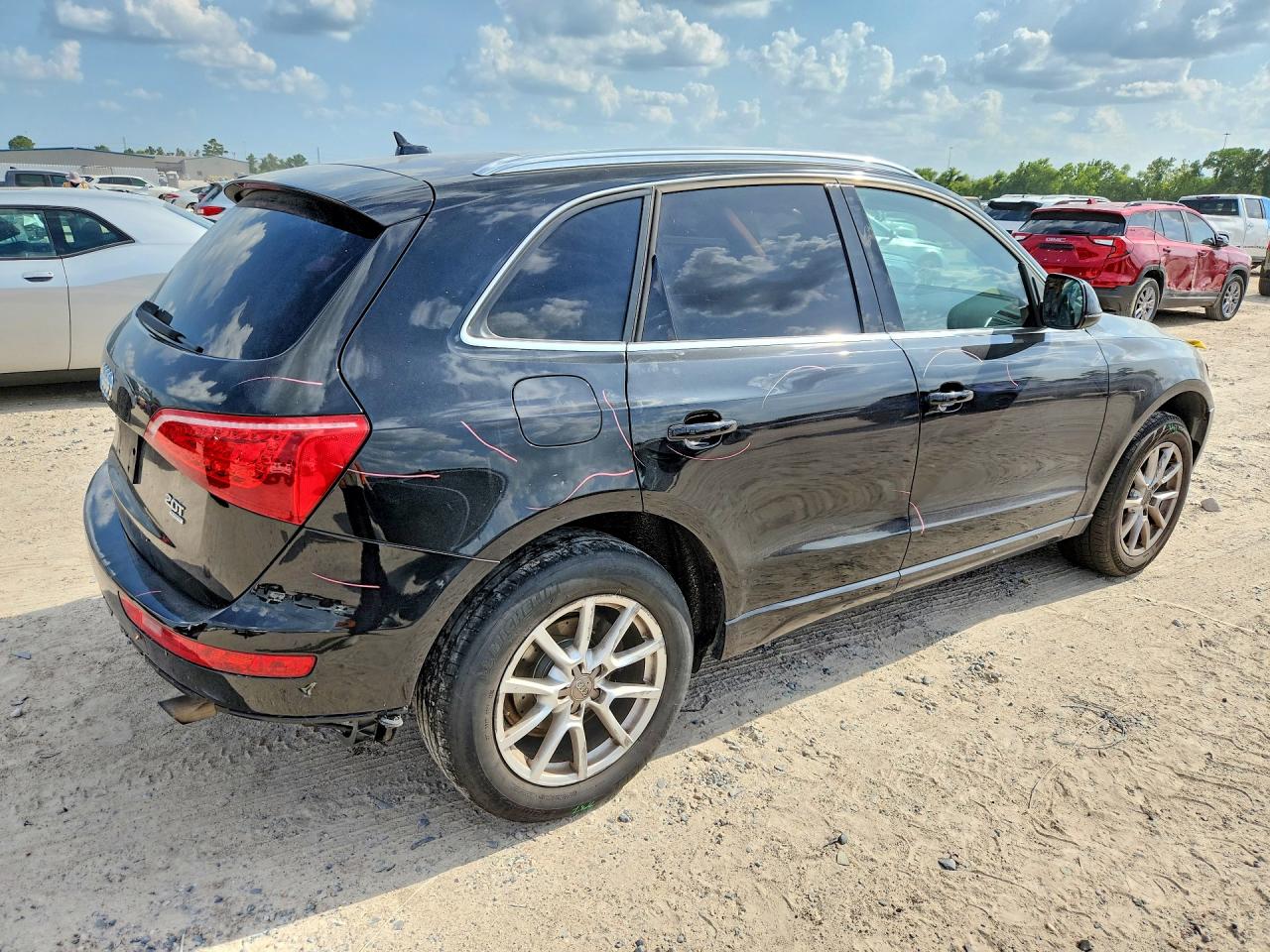 WA1CFAFP7BA008268 · 2011 AUDI Q5 · 3/12