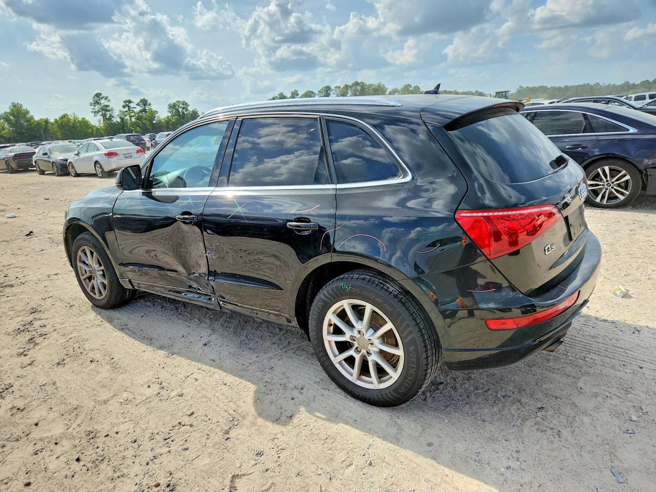 WA1CFAFP7BA008268 · 2011 AUDI Q5 · 2/12