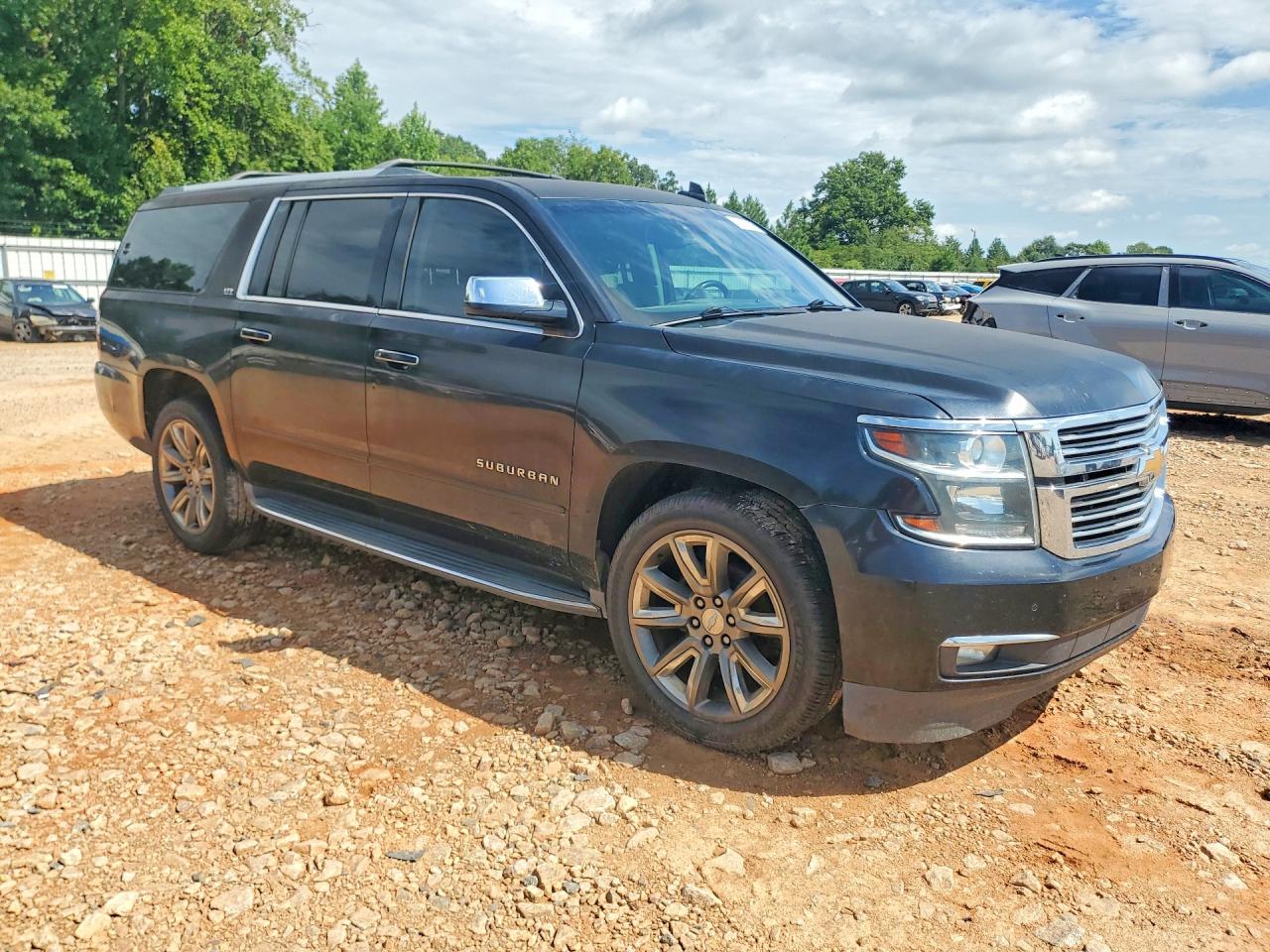 1GNSKKKCXFR641948 · 2015 CHEVROLET SUBURBAN · 4/13