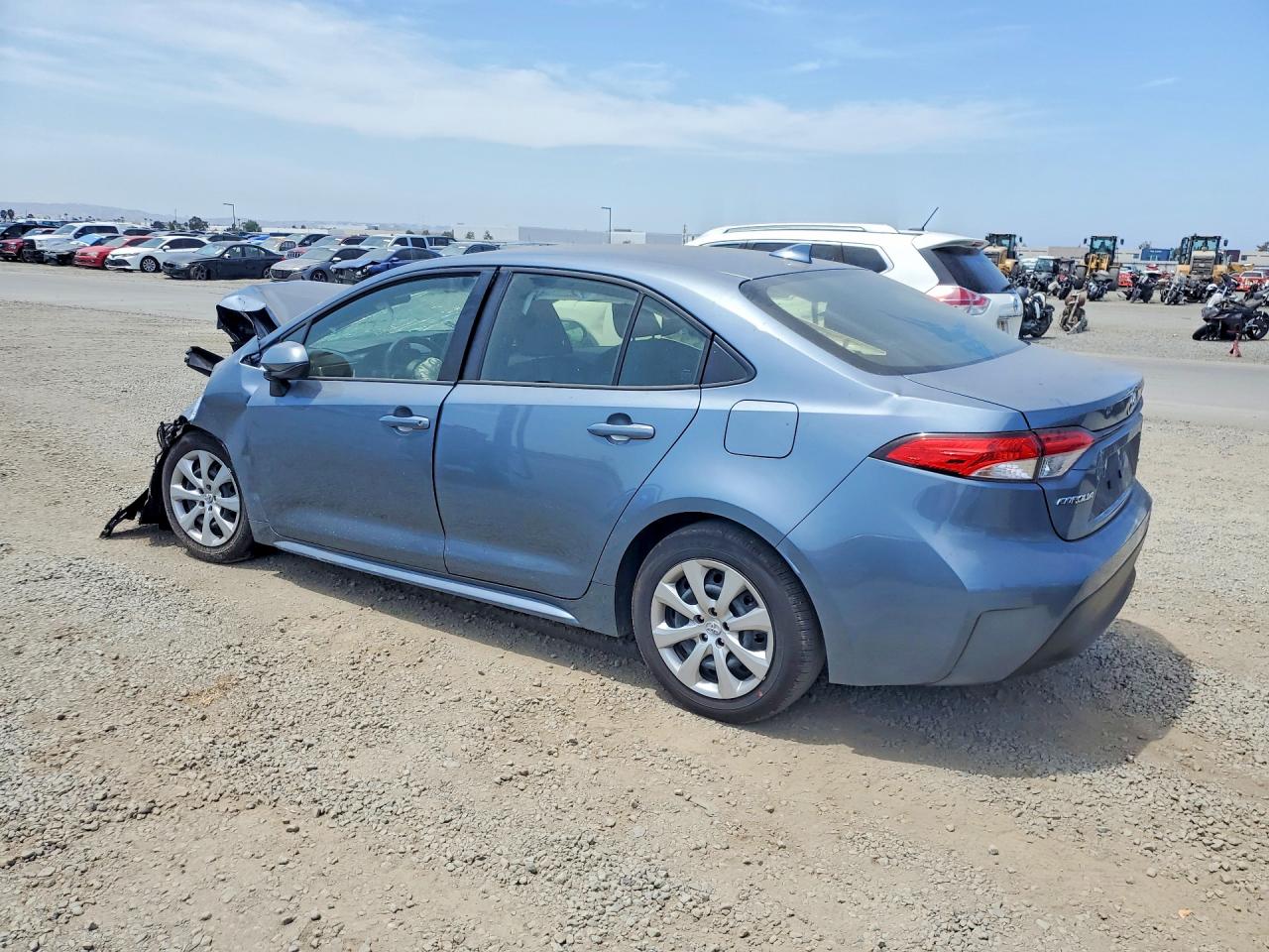 JTDBCMFE4T3132319 · 2026 TOYOTA COROLLA HYBRID · 2/13