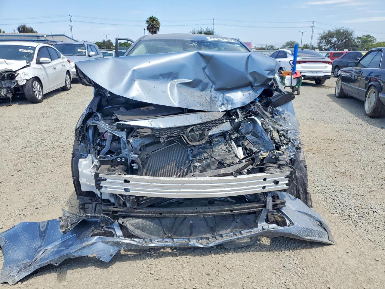 JTDBCMFE4T3132319 · 2026 TOYOTA COROLLA HYBRID · 5/13