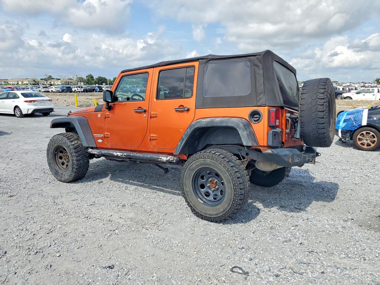 1J4HA6H1XBL638459 · 2011 JEEP WRANGLER UNLIMITED · 2/13