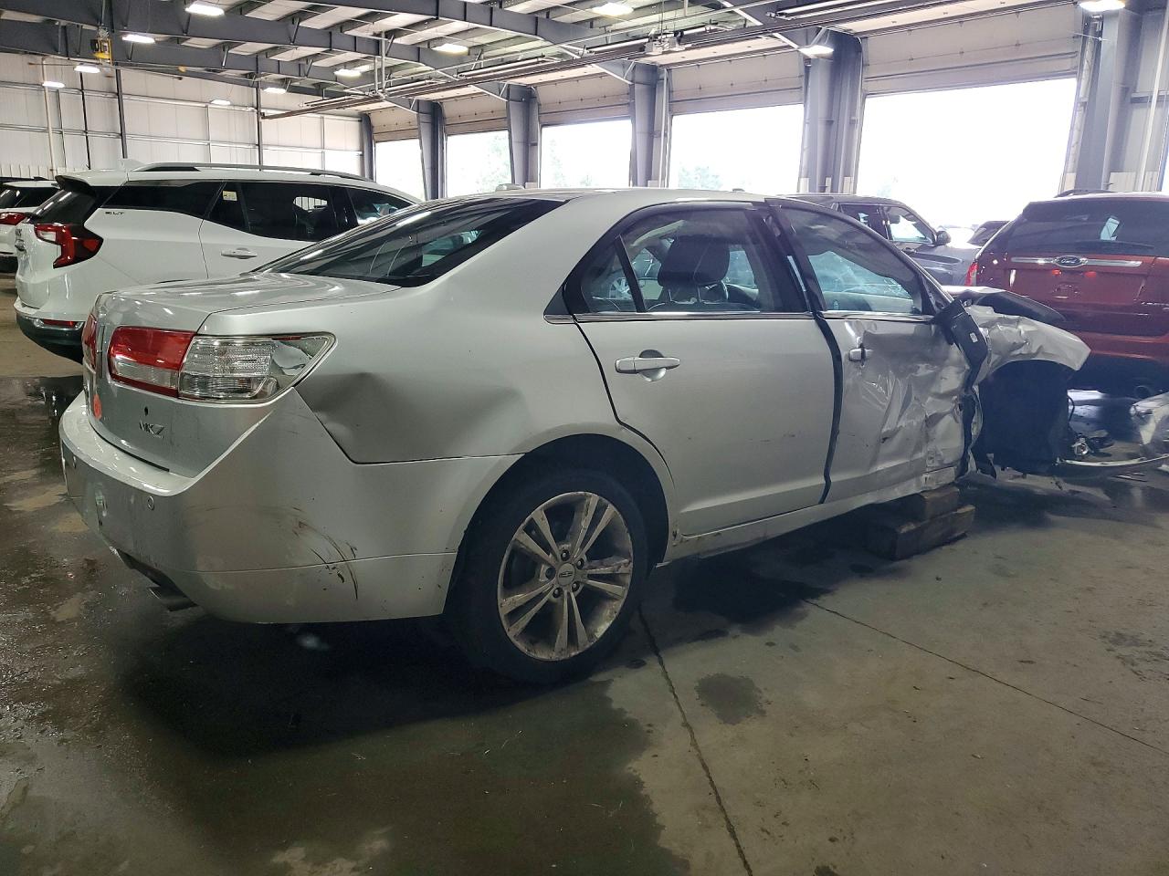 3LNHL2GC4BR756127 · 2011 LINCOLN MKZ · 3/13