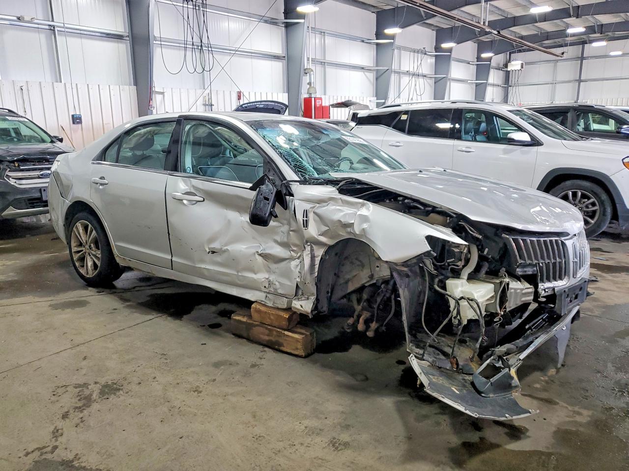 3LNHL2GC4BR756127 · 2011 LINCOLN MKZ · 4/13