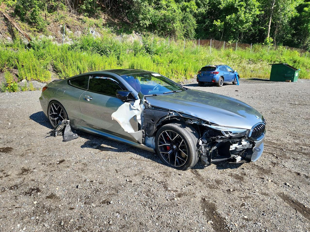 WBSAE0C07NCJ77306 · 2022 BMW M8 · 4/12