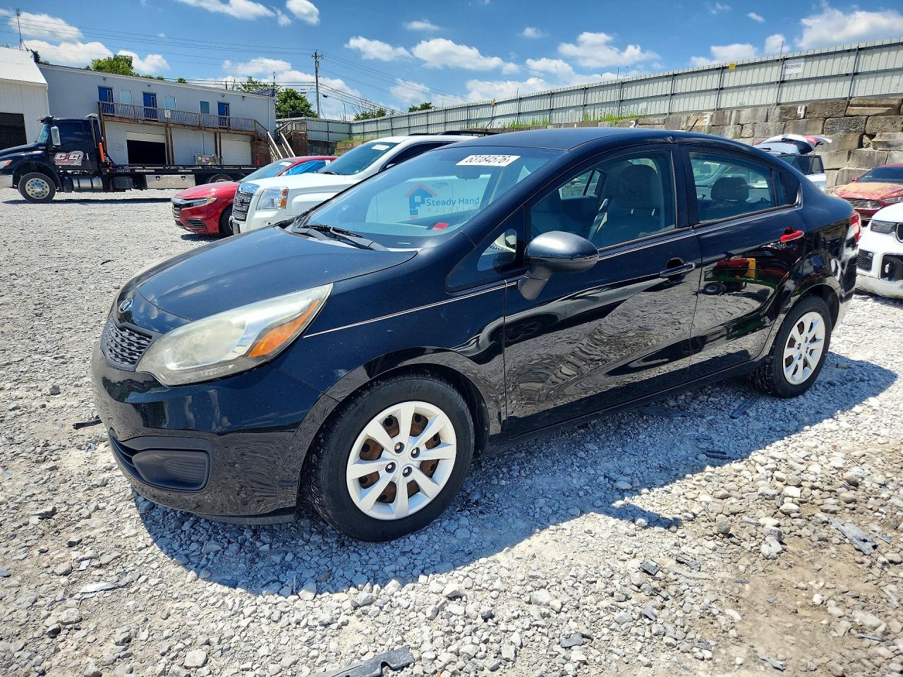 KNADM4A36E6406047 · 2014 KIA RIO
