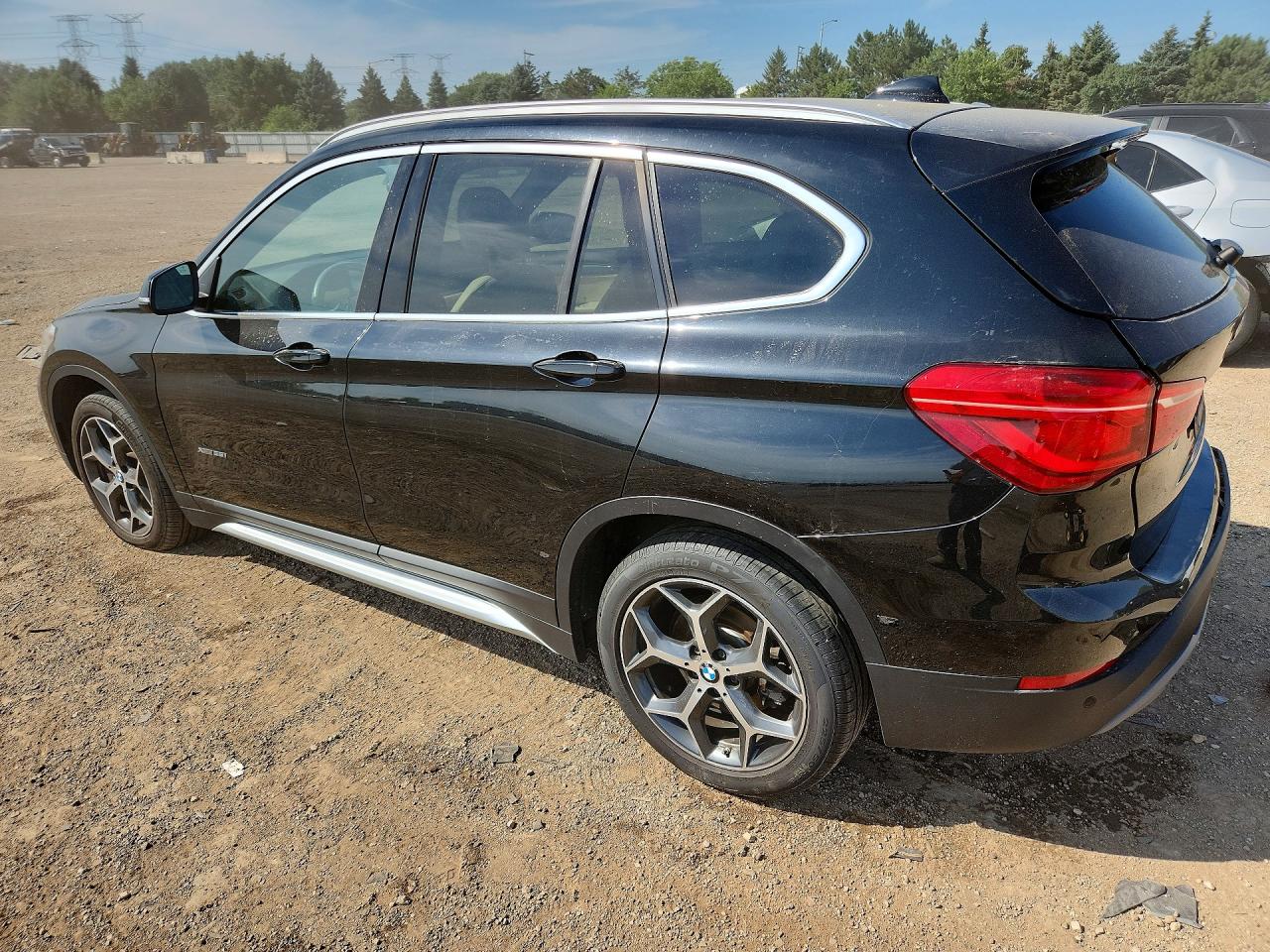 WBXHT3C35GP884376 · 2016 BMW X1 · 2/13