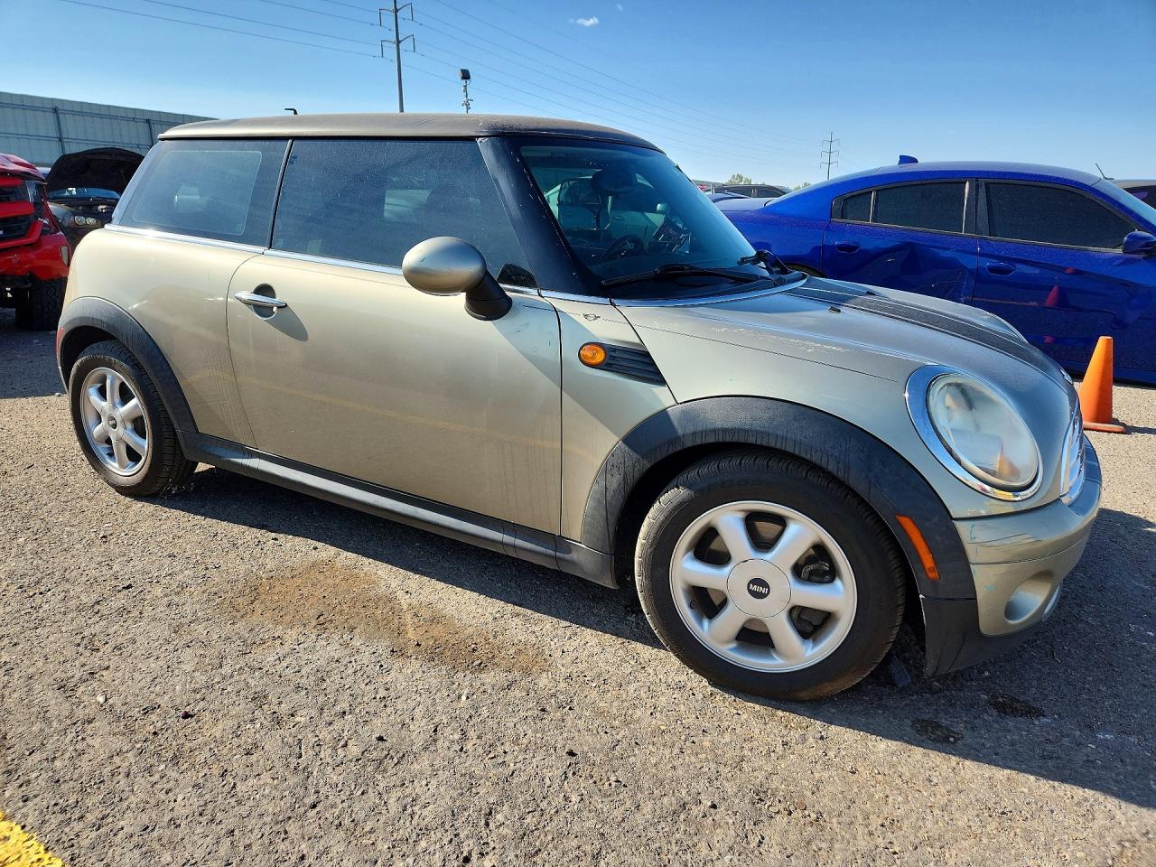 WMWMF33579TW78309 · 2009 MINI COOPER · 4/12