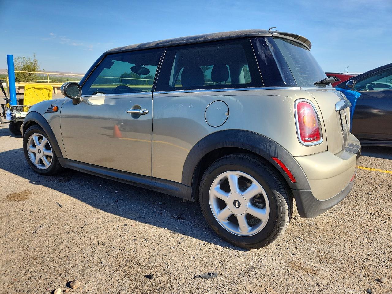 WMWMF33579TW78309 · 2009 MINI COOPER · 2/12