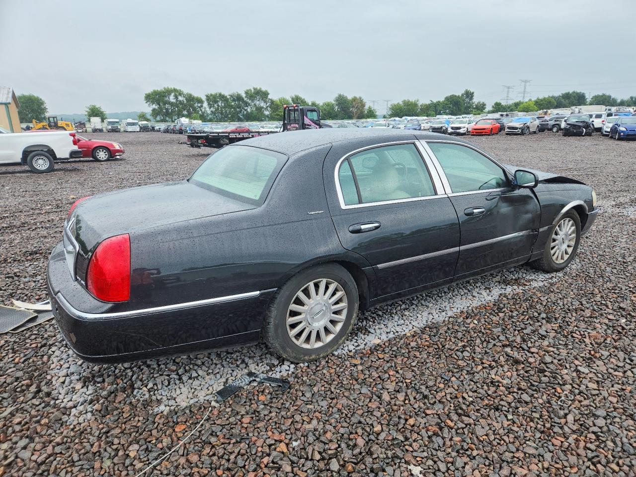 1LNHM82W43Y703335 · 2003 LINCOLN TOWN CAR · 3/12