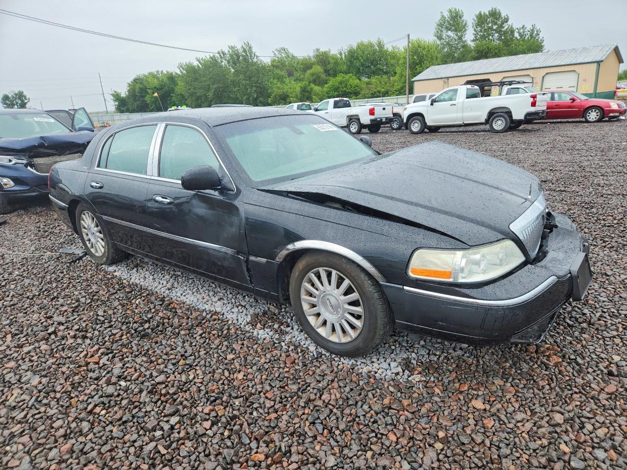 1LNHM82W43Y703335 · 2003 LINCOLN TOWN CAR · 4/12
