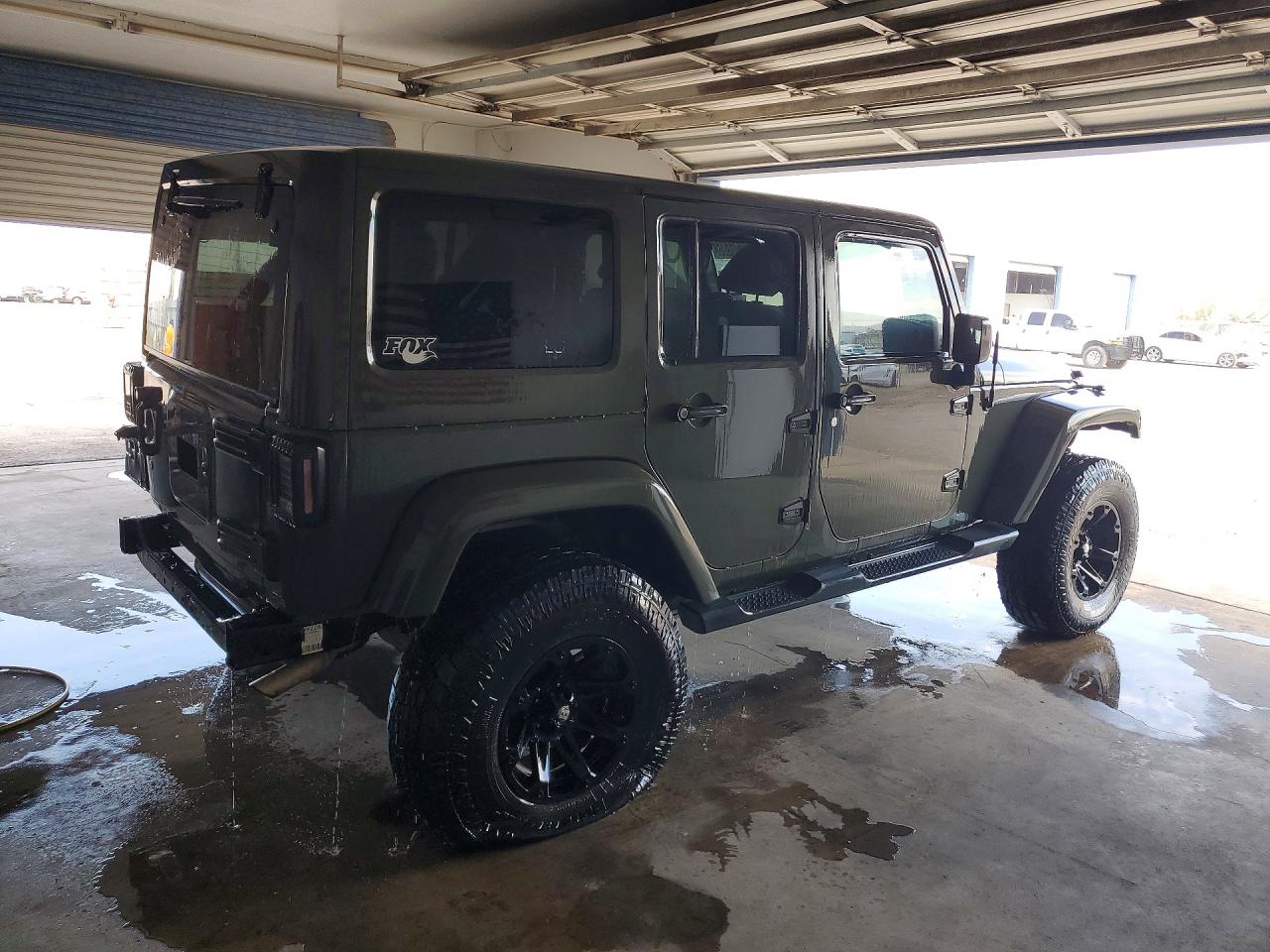 1C4BJWEG9FL723142 · 2015 JEEP WRANGLER UNLIMITED · 3/14