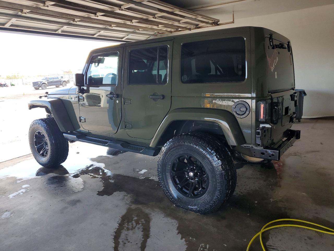 1C4BJWEG9FL723142 · 2015 JEEP WRANGLER UNLIMITED · 2/14
