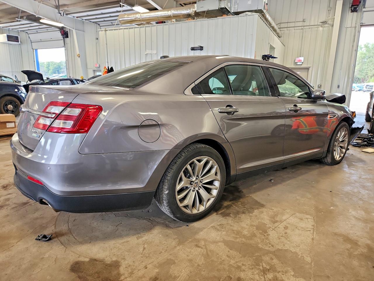 1FAHP2J89EG125680 · 2014 FORD TAURUS · 3/12