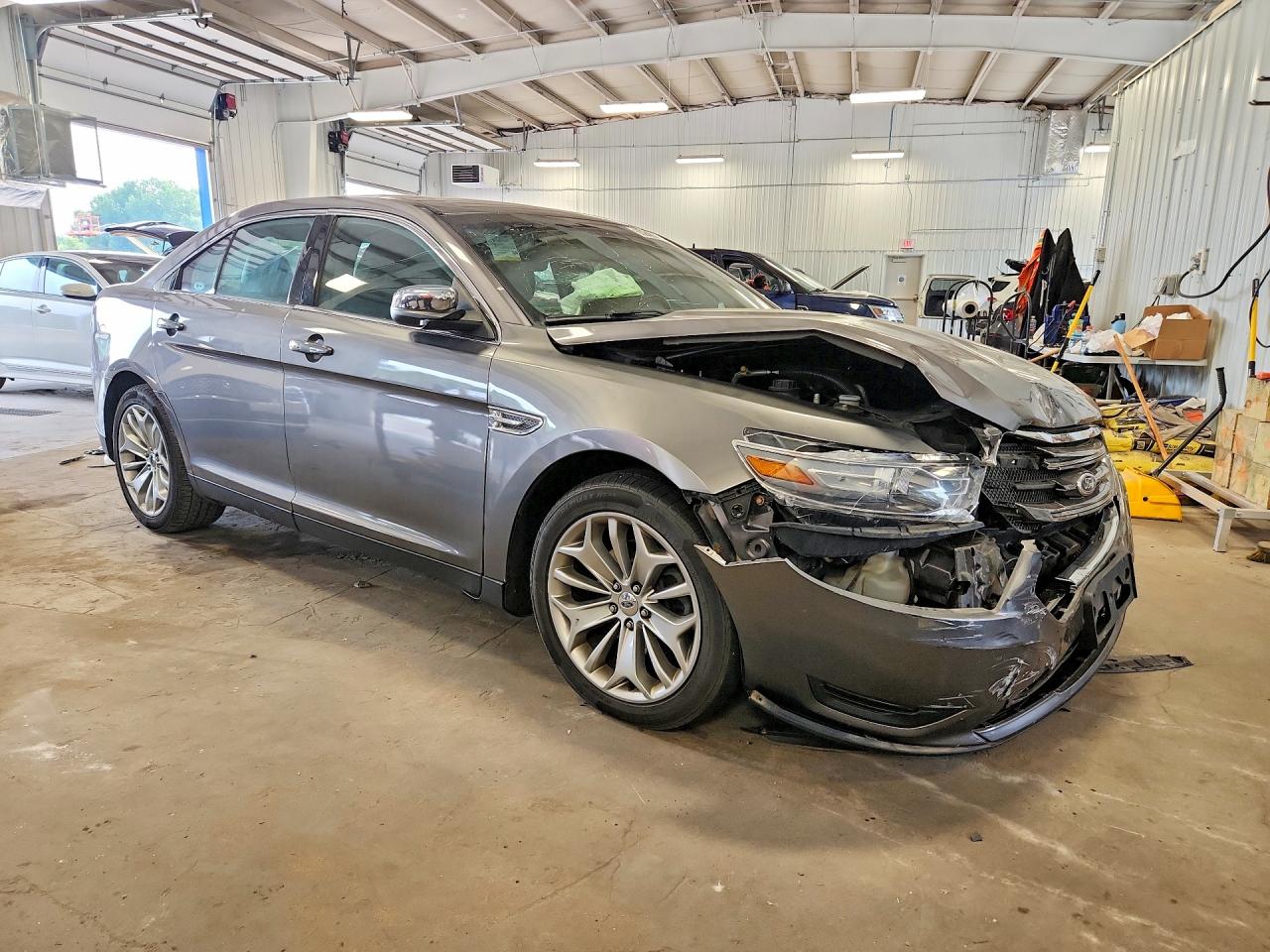 1FAHP2J89EG125680 · 2014 FORD TAURUS · 4/12