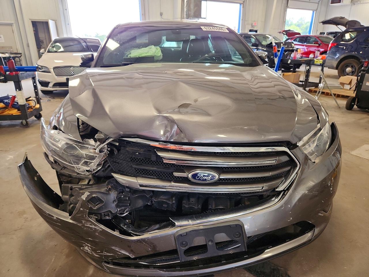 1FAHP2J89EG125680 · 2014 FORD TAURUS · 5/12