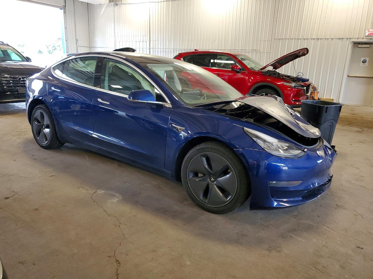5YJ3E1EA4LF792424 · 2020 TESLA MODEL 3 · 4/13