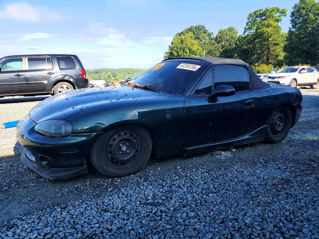 JM1NB3534X0100617 · 1999 MAZDA MX-5 MIATA