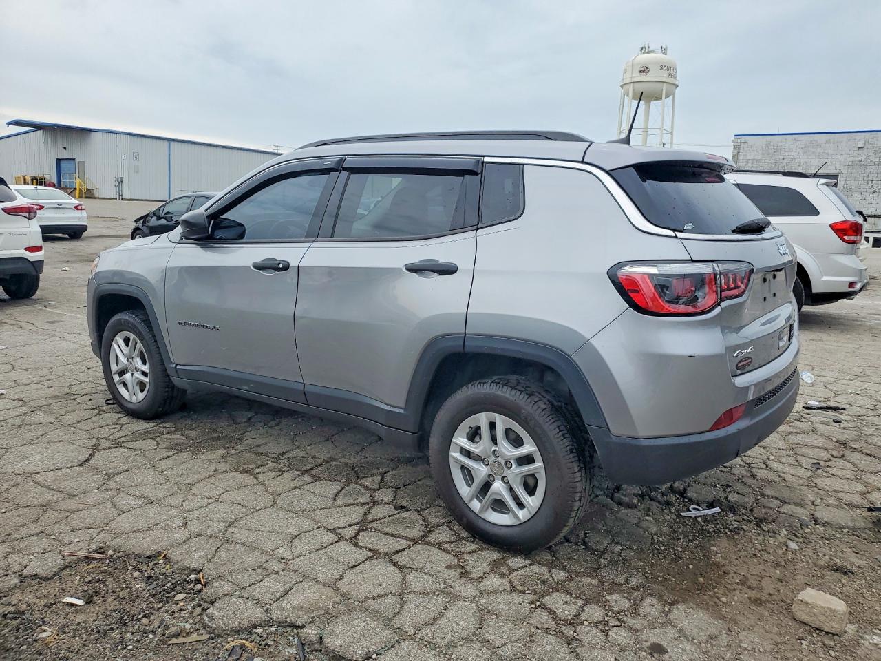 3C4NJDAB4LT209369 · 2020 JEEP COMPASS · 2/14