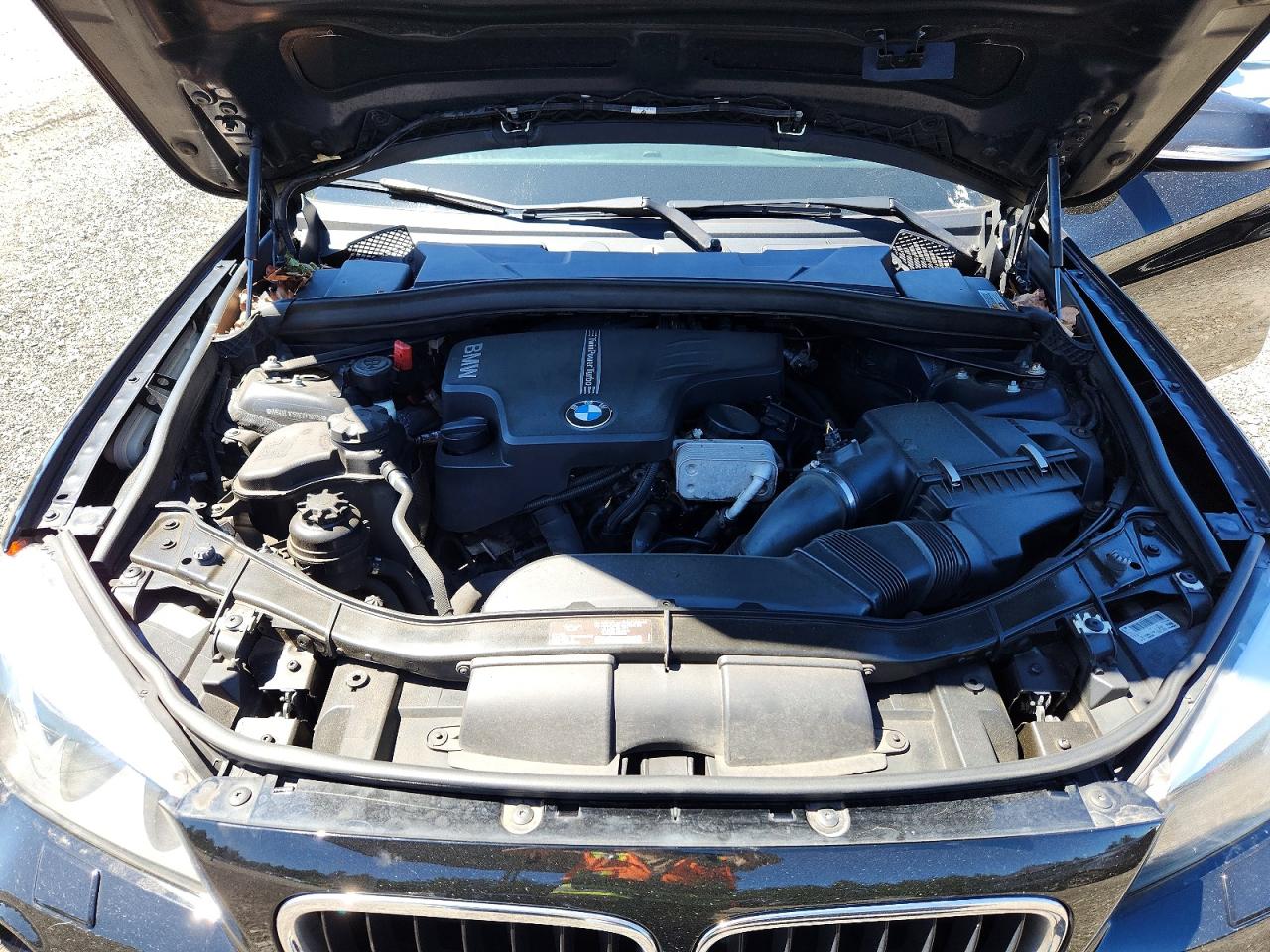 WBAVL1C57EVY10789 · 2014 BMW X1 · 12/13
