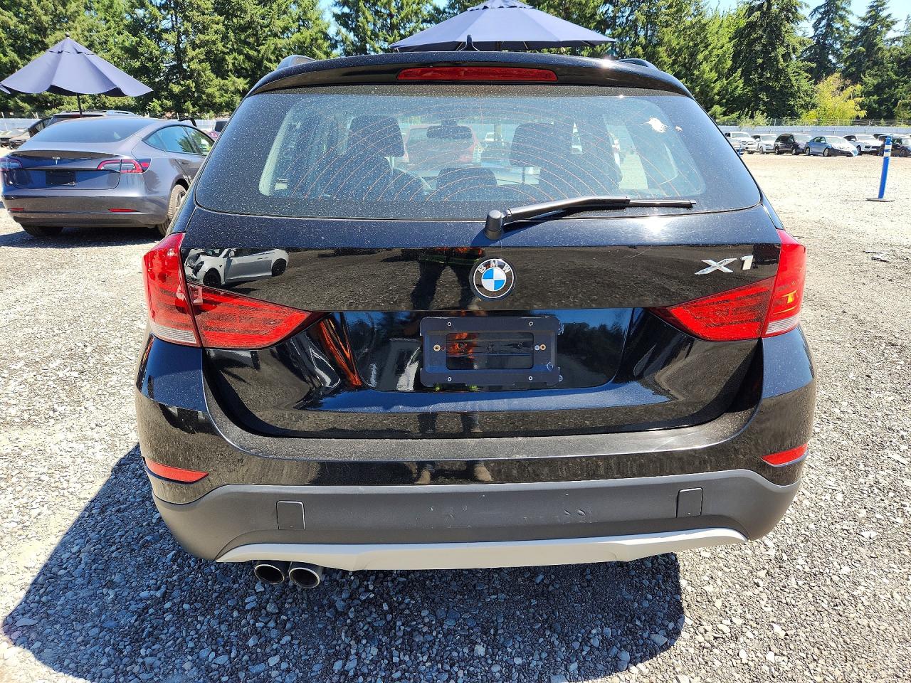 WBAVL1C57EVY10789 · 2014 BMW X1 · 6/13