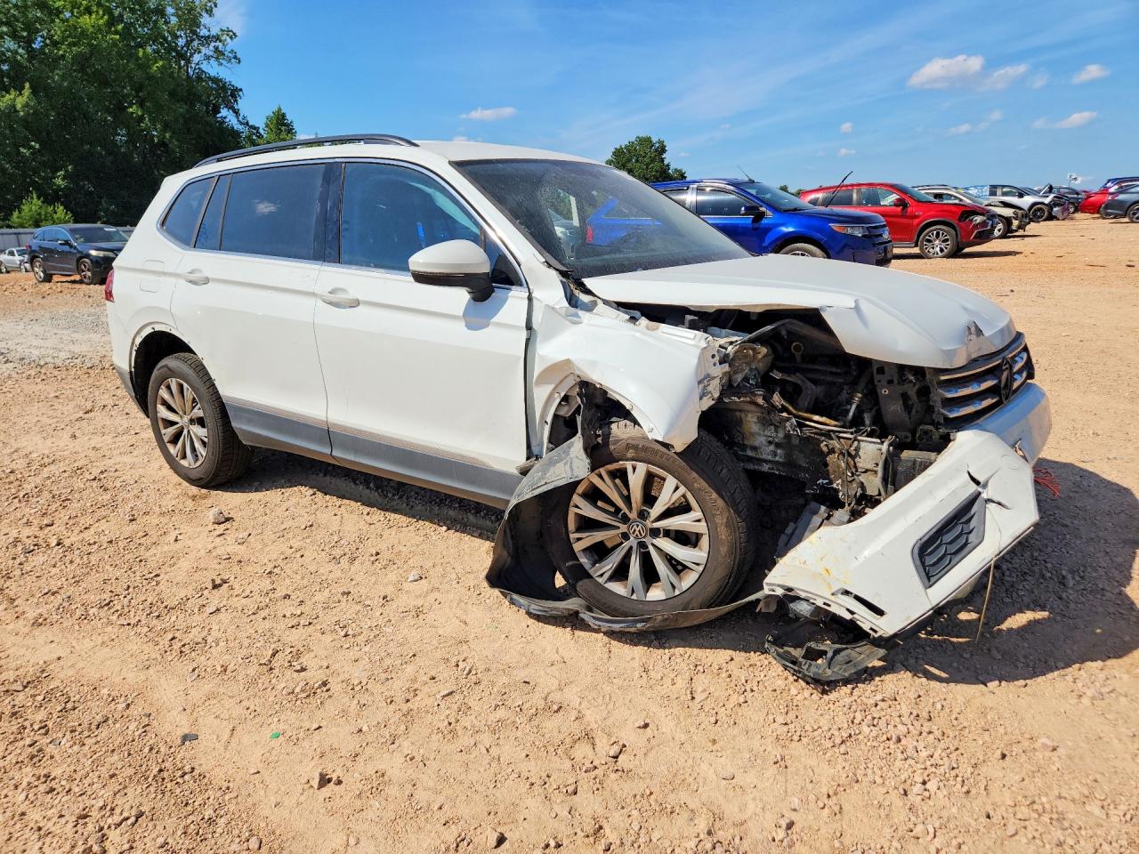 3VV3B7AX8JM031427 · 2018 VOLKSWAGEN TIGUAN · 4/13