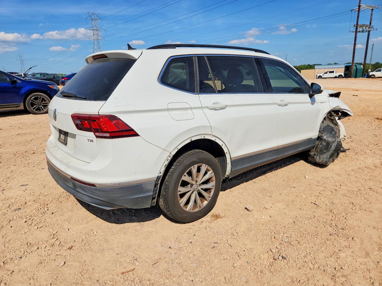 3VV3B7AX8JM031427 · 2018 VOLKSWAGEN TIGUAN · 3/13