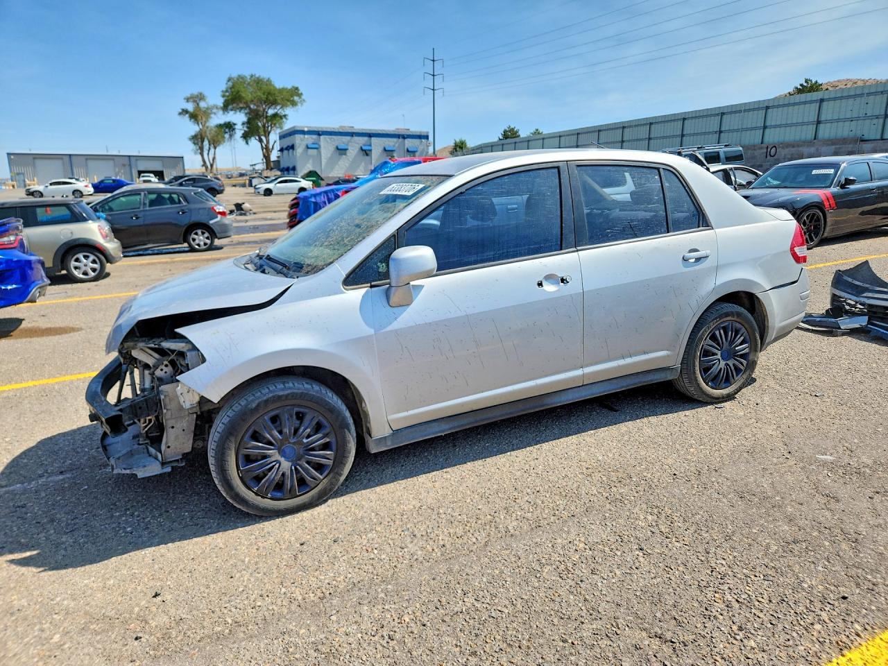 3N1BC11E19L494937 · 2009 NISSAN VERSA