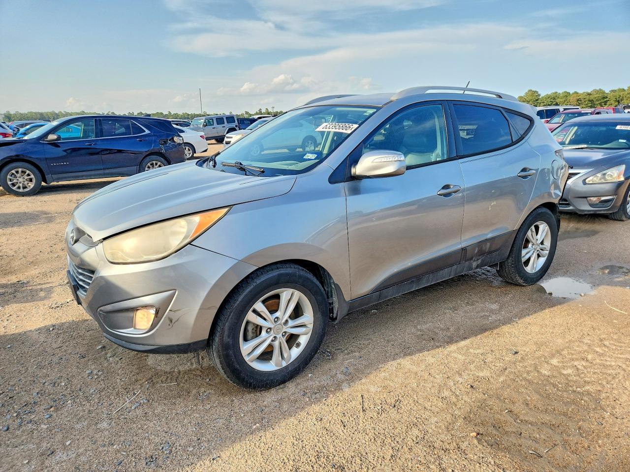 KM8JU3AC9DU660230 · 2013 HYUNDAI TUCSON