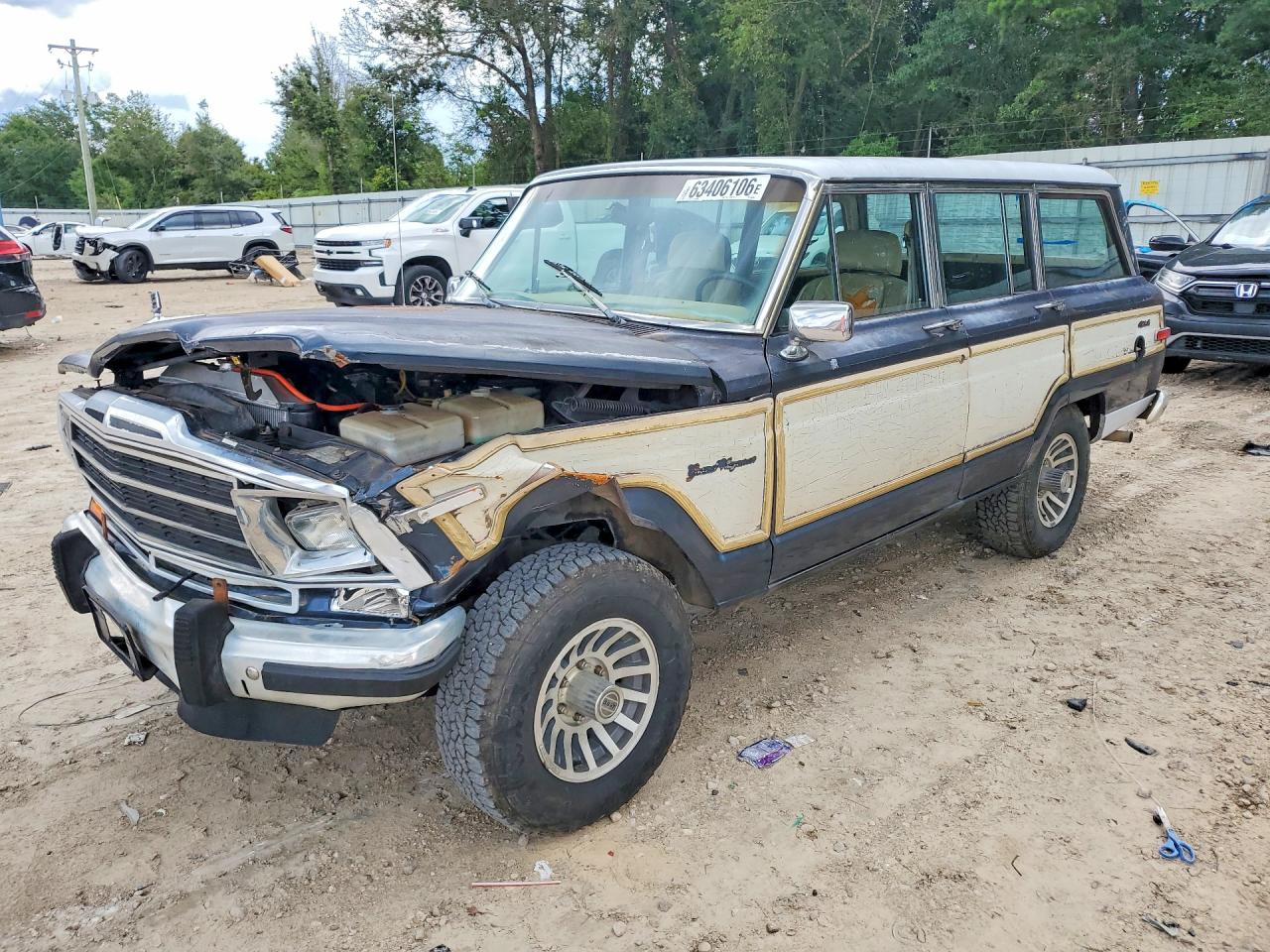1J4GS5876LP501021 · 1990 JEEP GRAND WAGONEER