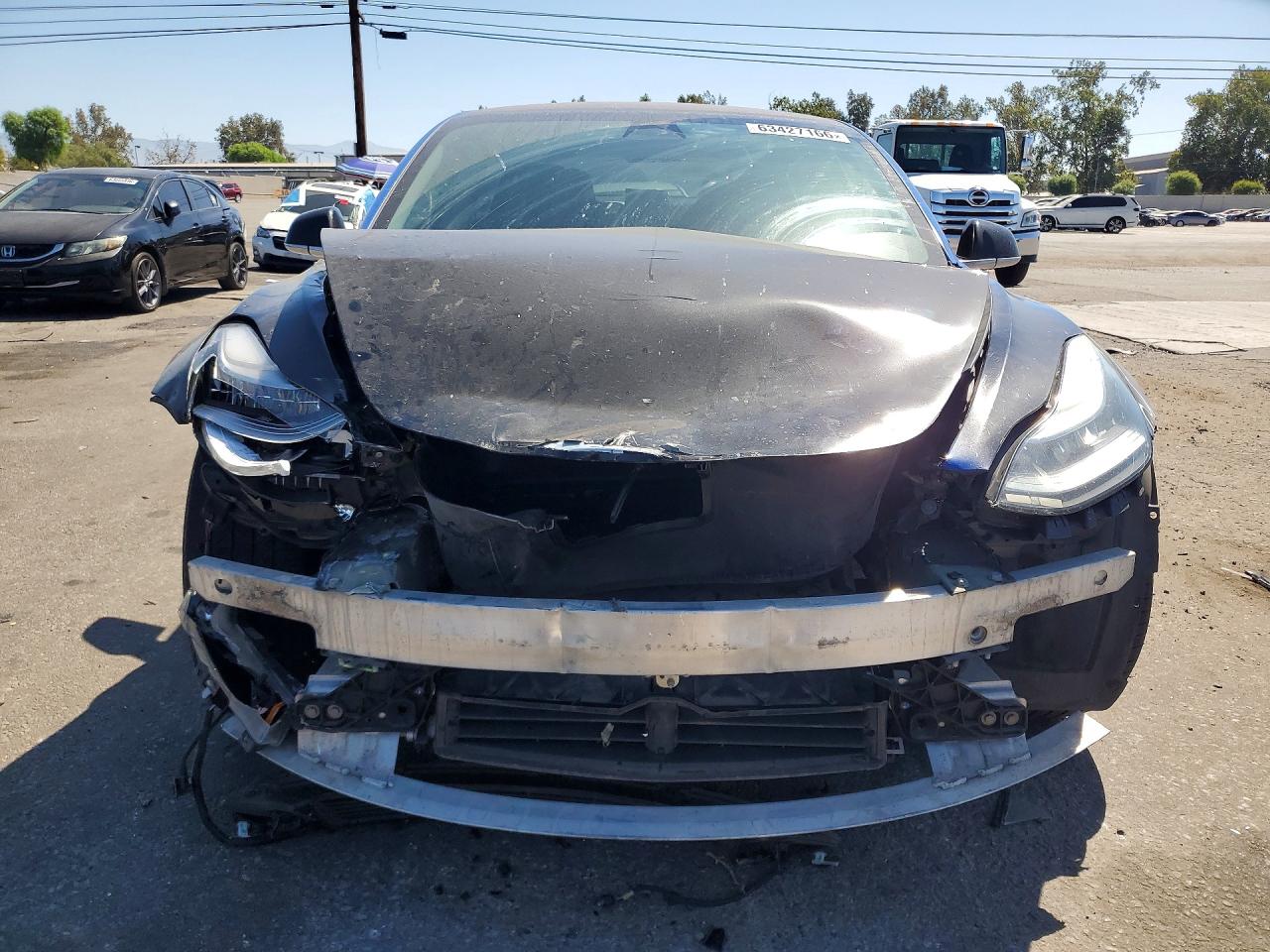 5YJ3E1EA4JF034385 · 2018 TESLA MODEL 3 · 5/12