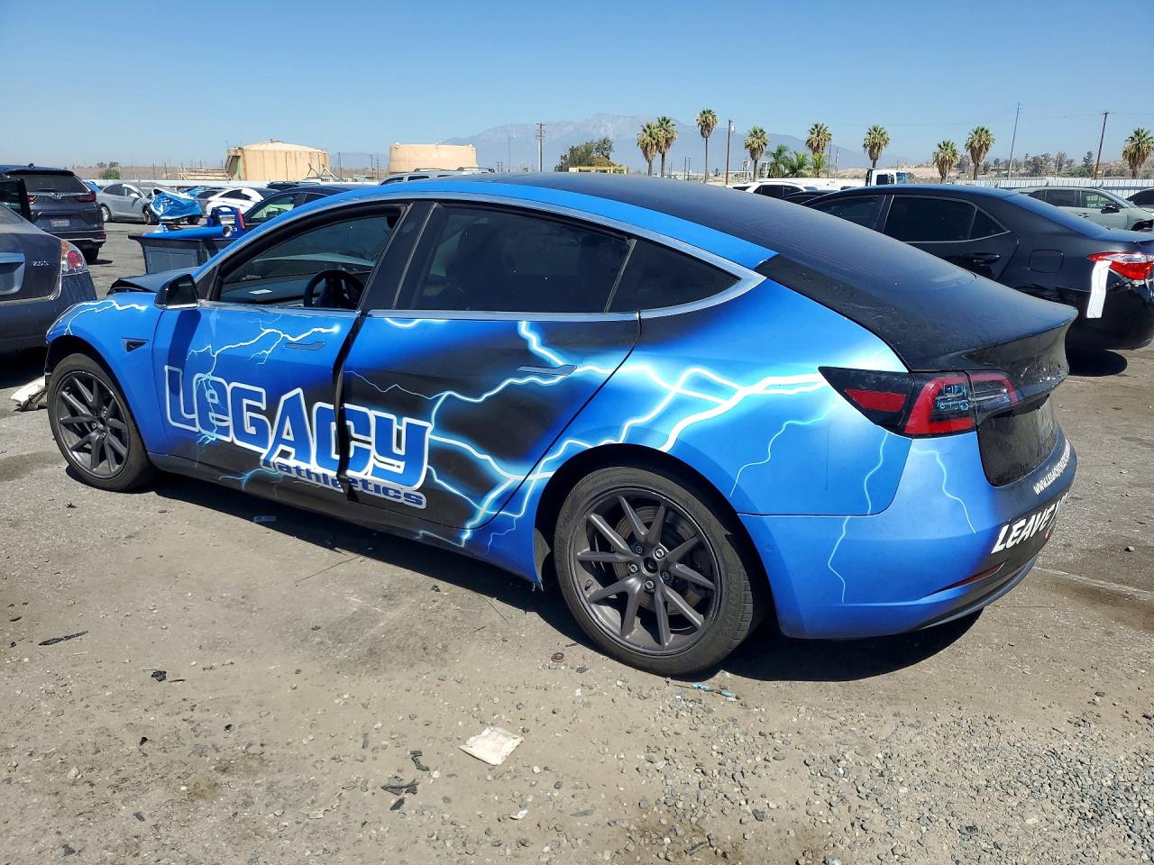 5YJ3E1EA4JF034385 · 2018 TESLA MODEL 3 · 2/12