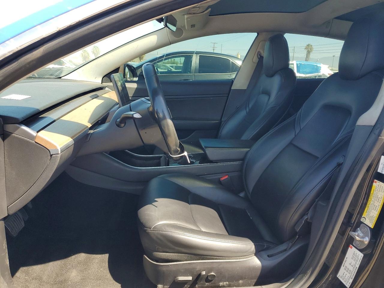 5YJ3E1EA4JF034385 · 2018 TESLA MODEL 3 · 7/12