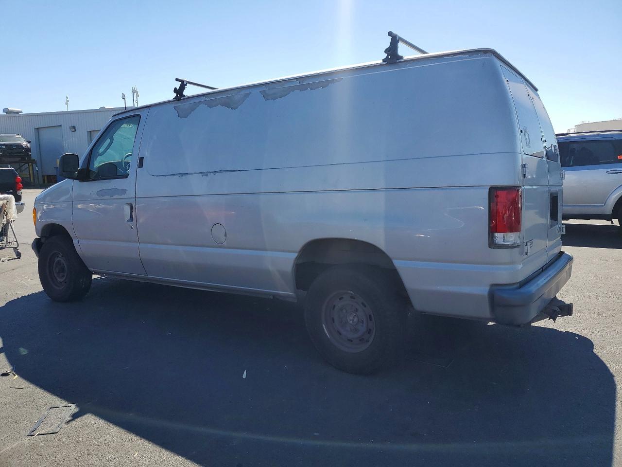 1FTRE14L73HA87744 · 2003 FORD ECONOLINE · 2/12