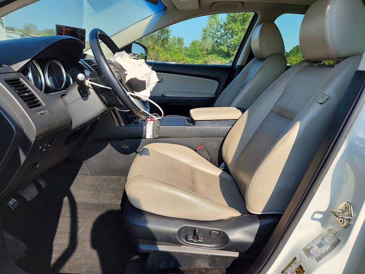 JM3TB2CA1F0448867 · 2015 MAZDA CX-9 · 7/12