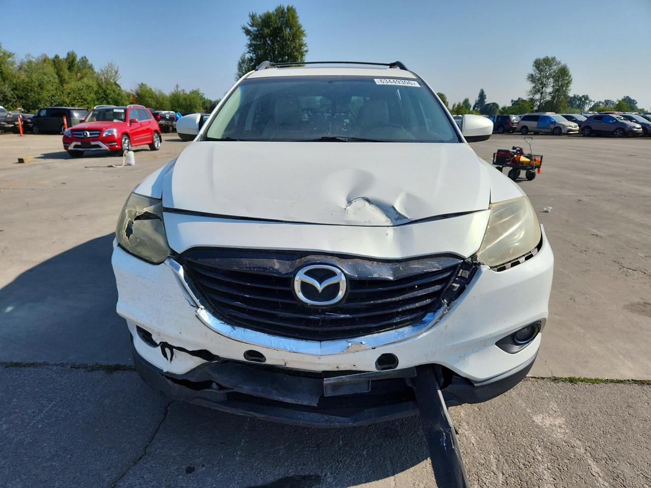 JM3TB2CA1F0448867 · 2015 MAZDA CX-9 · 5/12