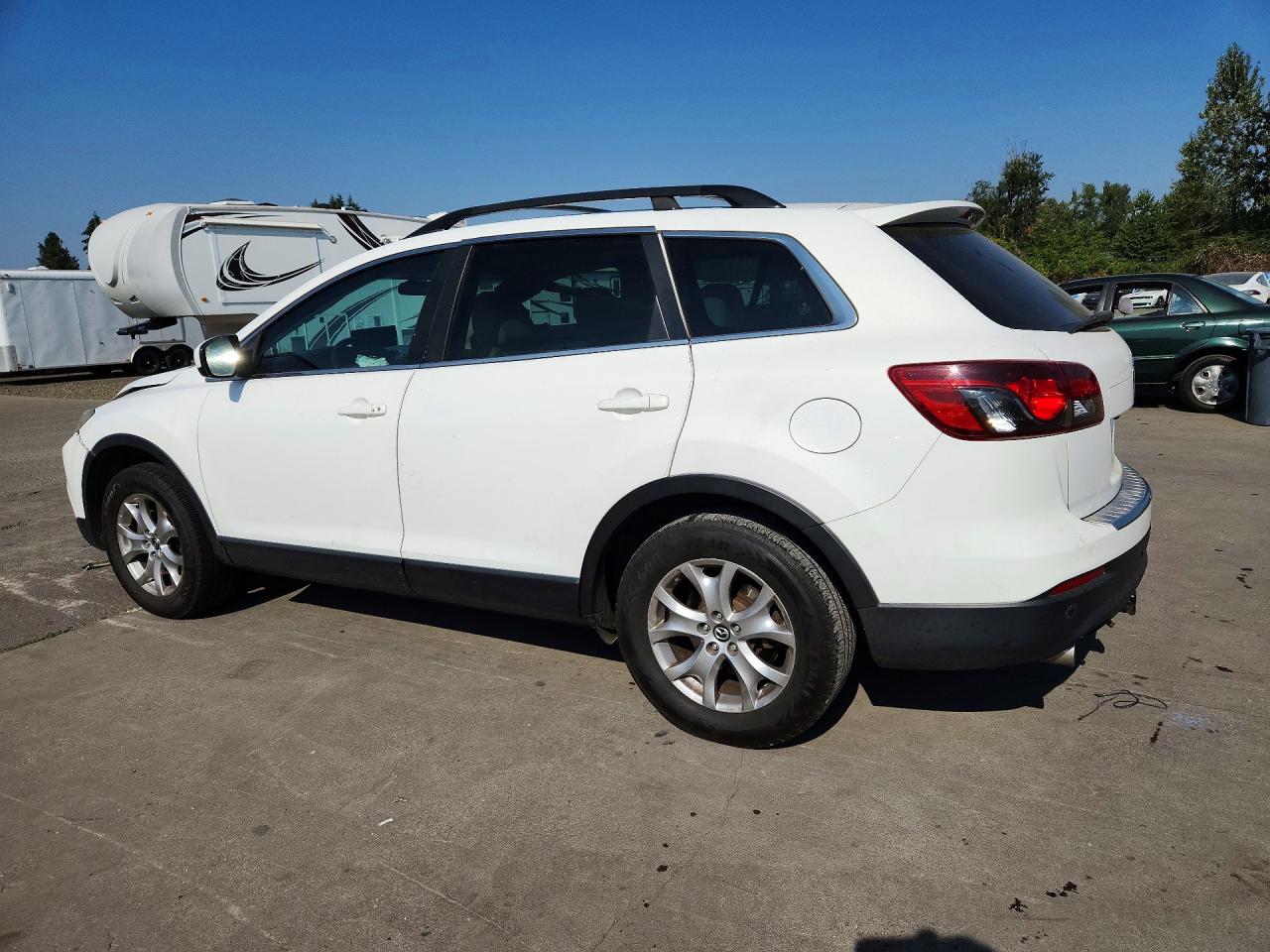 JM3TB2CA1F0448867 · 2015 MAZDA CX-9 · 2/12