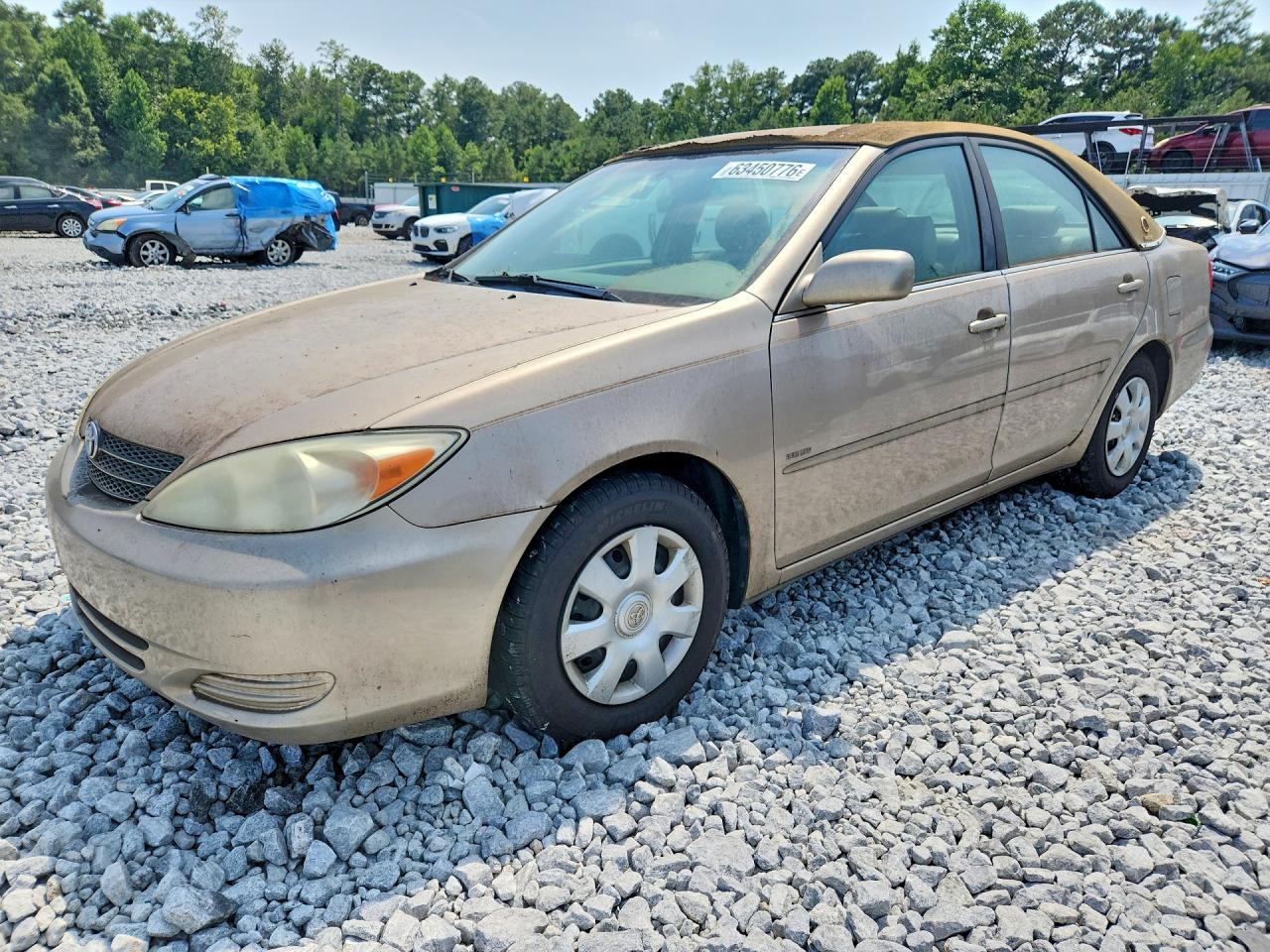 4T1BE32KX2U050504 · 2002 TOYOTA CAMRY