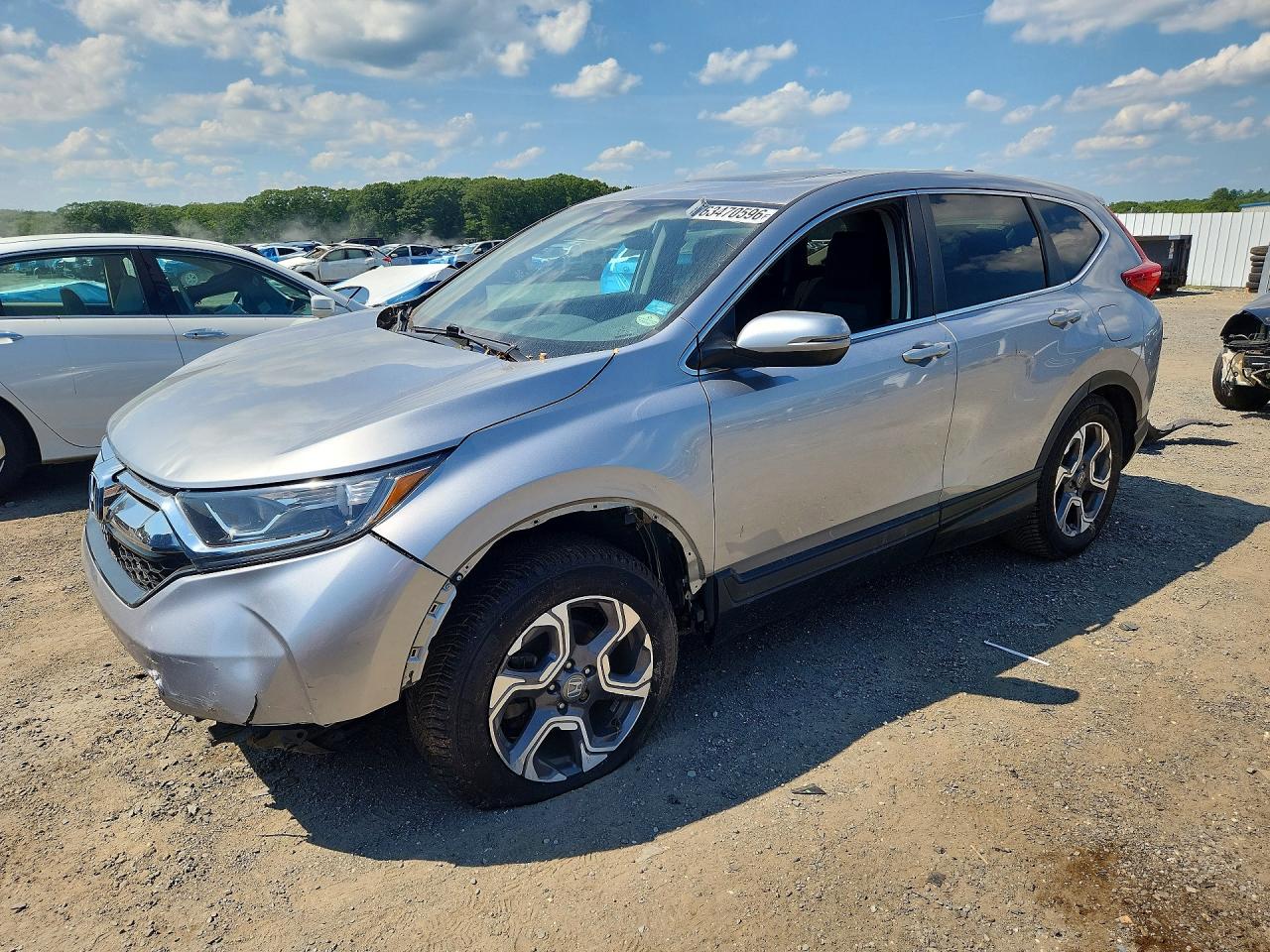 7FARW2H57JE009321 · 2018 HONDA CR-V