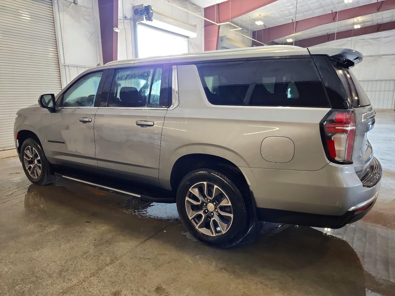 1GNSKBKD4PR210449 · 2023 CHEVROLET SUBURBAN · 2/13