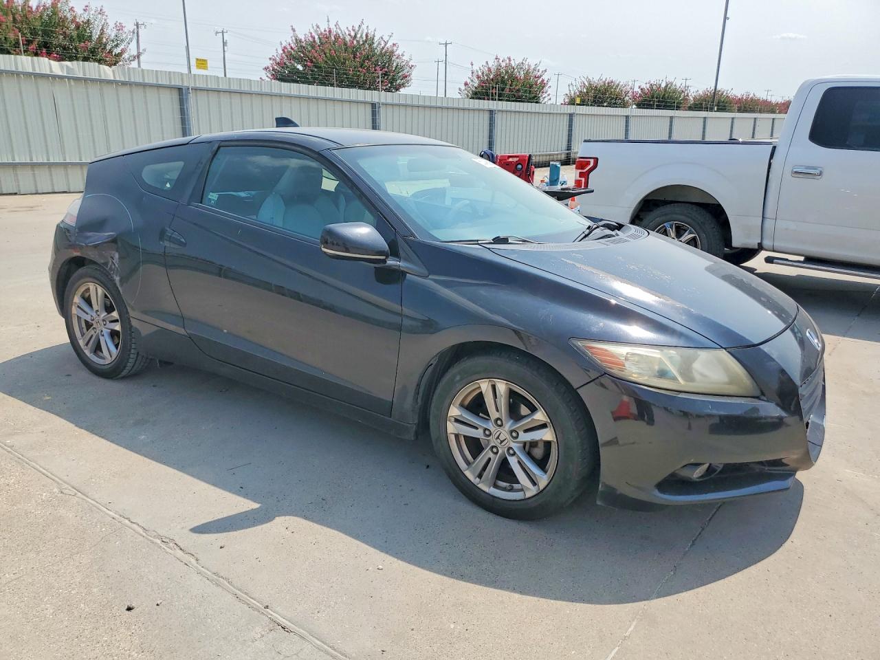 JHMZF1D62BS003529 · 2011 HONDA CR-Z · 4/12