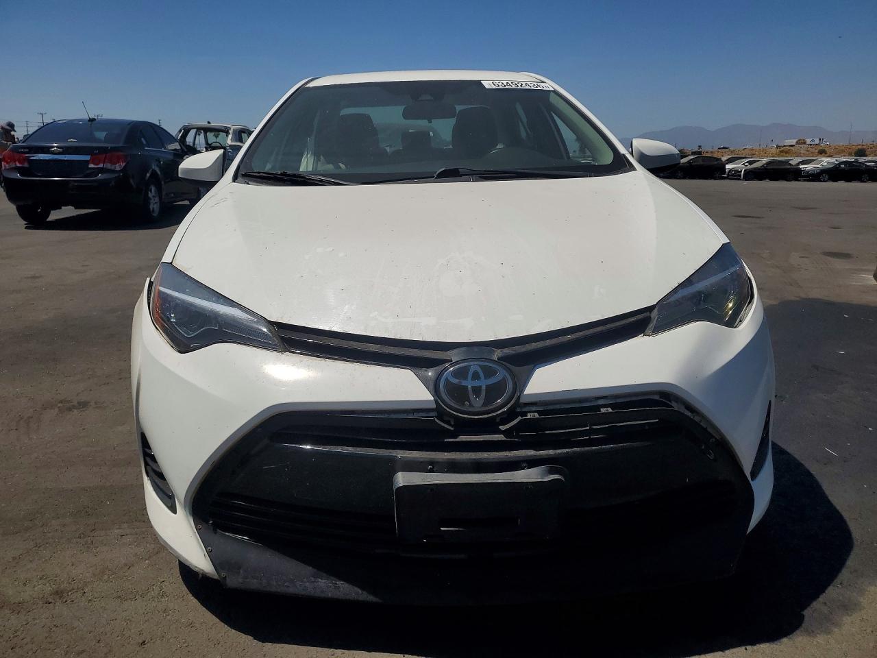 2T1BURHE6JC031083 · 2018 TOYOTA COROLLA · 5/12