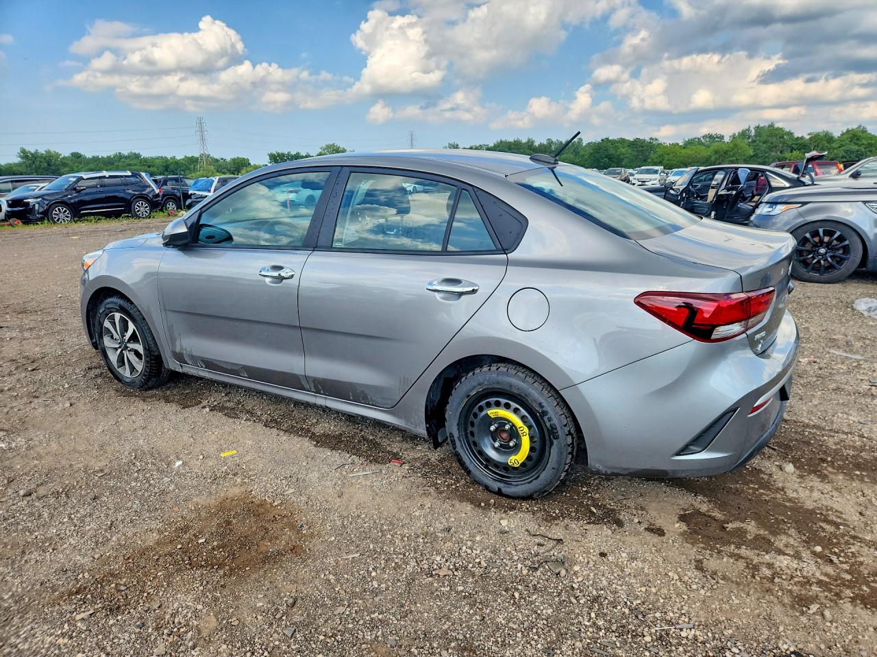 3KPA24AD4PE572410 · 2023 KIA RIO · 2/11
