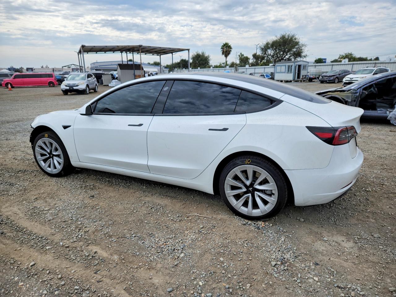 5YJ3E1EA7PF507527 · 2023 TESLA MODEL 3 · 2/13