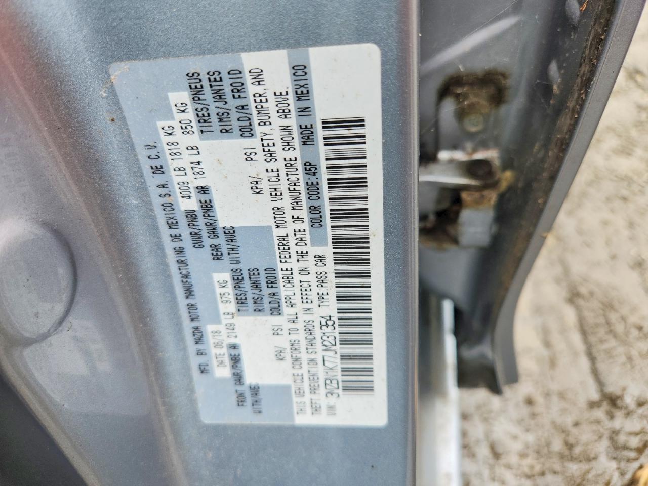 3MZBN1K77JM231354 · 2018 MAZDA 3 · 12/12