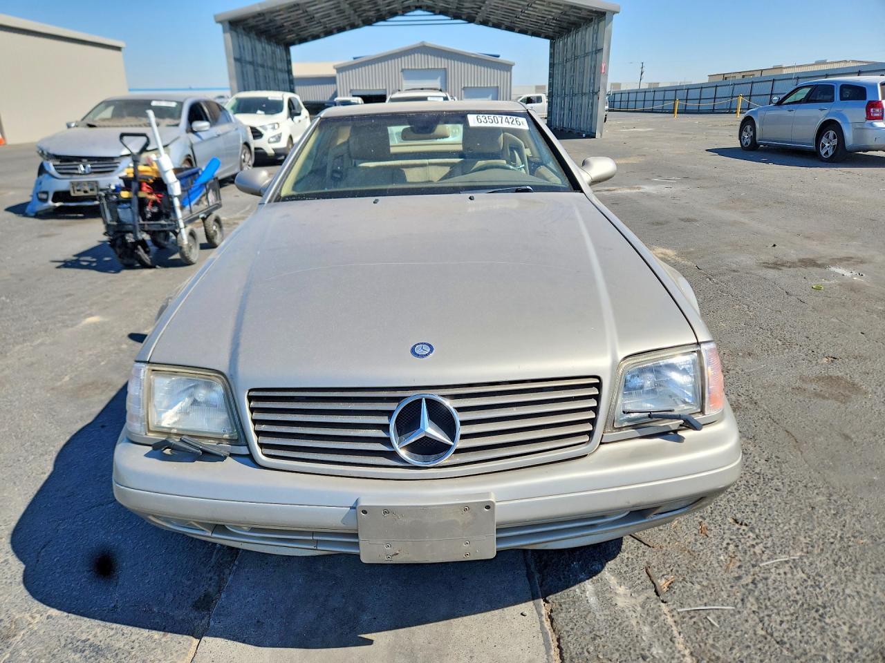 WDBFA68FXXF175834 · 1999 MERCEDES-BENZ SL · 5/12