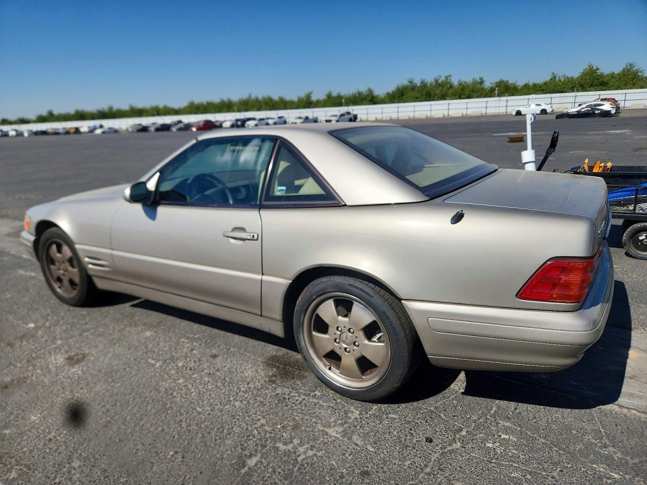 WDBFA68FXXF175834 · 1999 MERCEDES-BENZ SL · 2/12