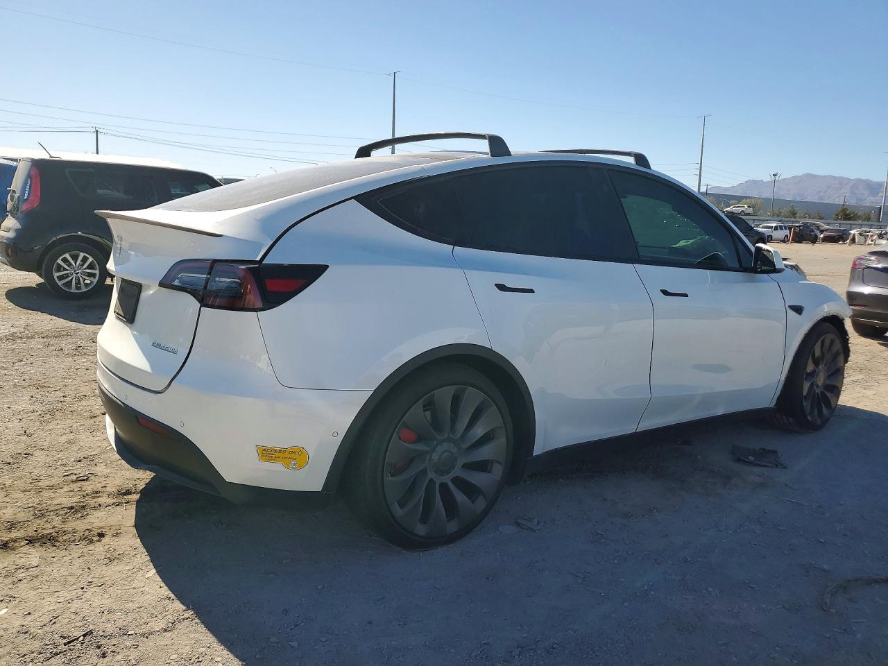 7SAYGDEF3NF416347 · 2022 TESLA MODEL Y · 3/14