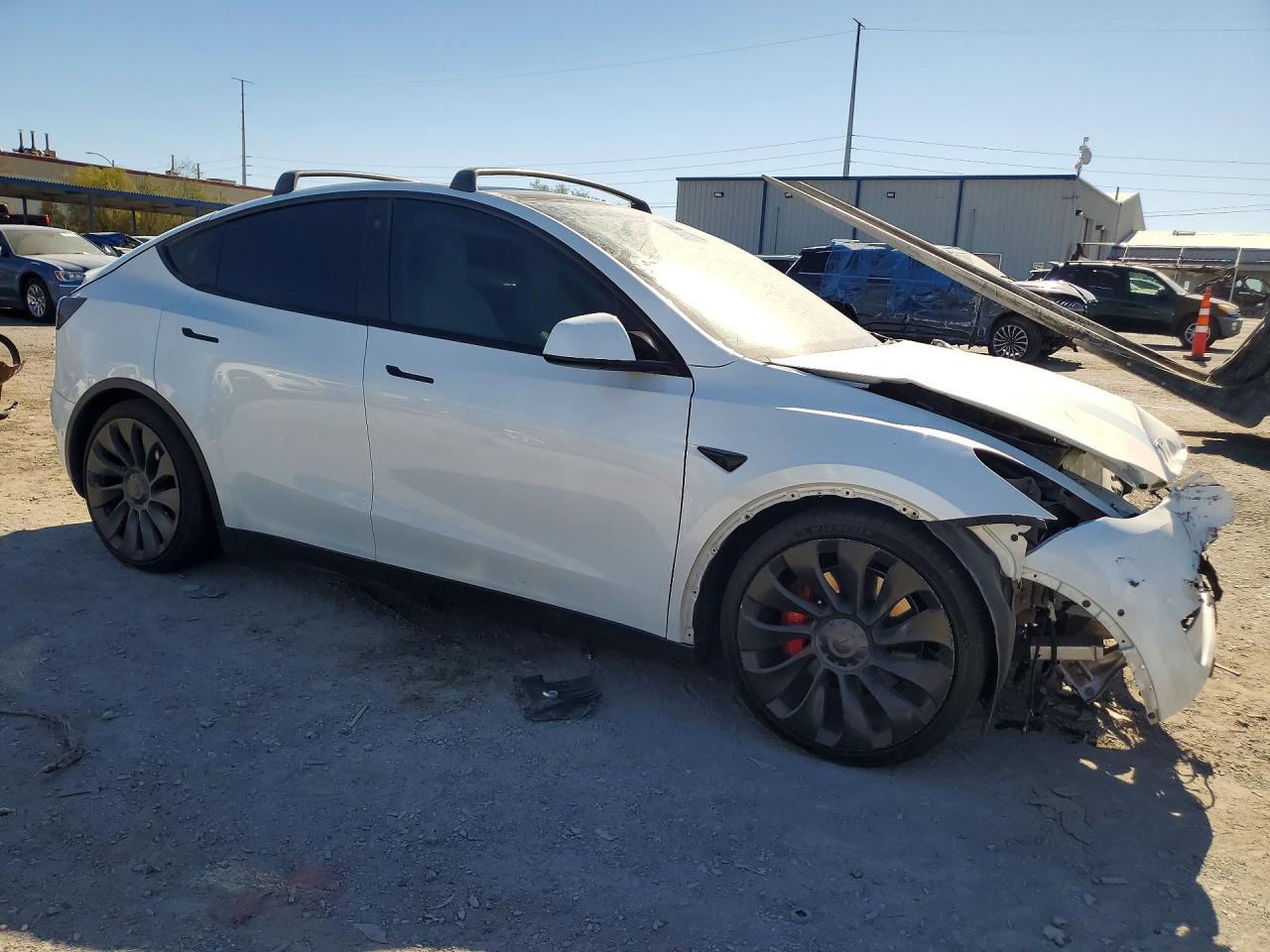7SAYGDEF3NF416347 · 2022 TESLA MODEL Y · 4/14